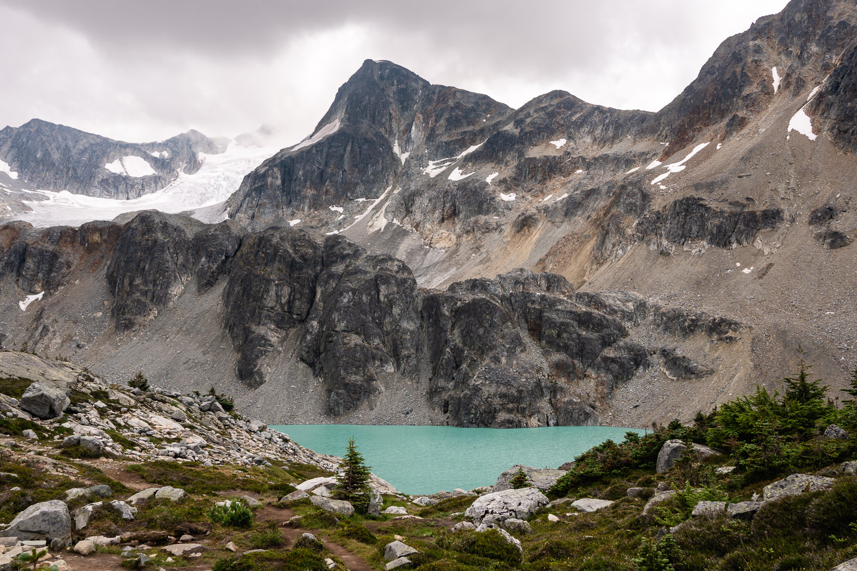 Stunning view of the Wedge Mountain from the north, with the turquoise Wedgemount Lake in the foreground.