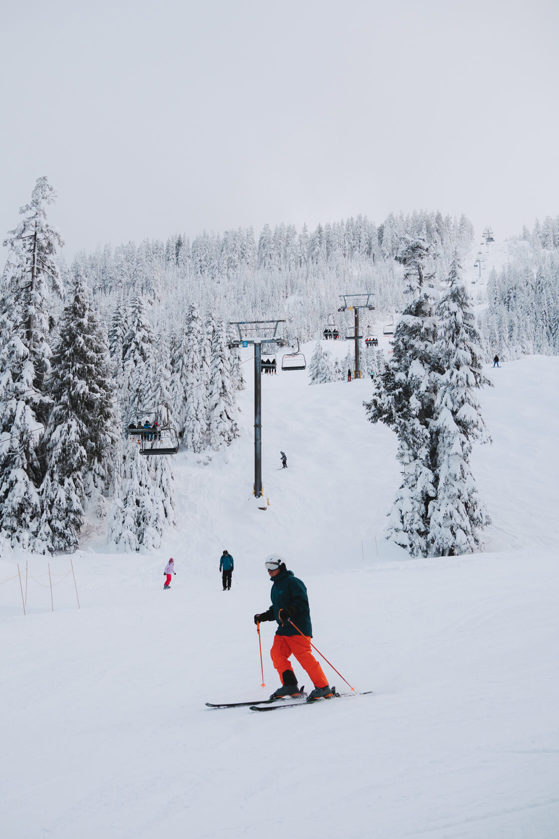 People skiing on the snow at Cypress mountain