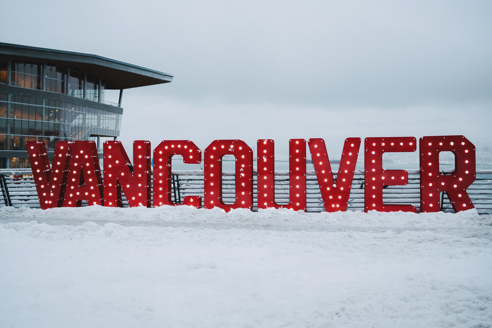 giant sign spelling out the letters VANCOUVER by Canada Place